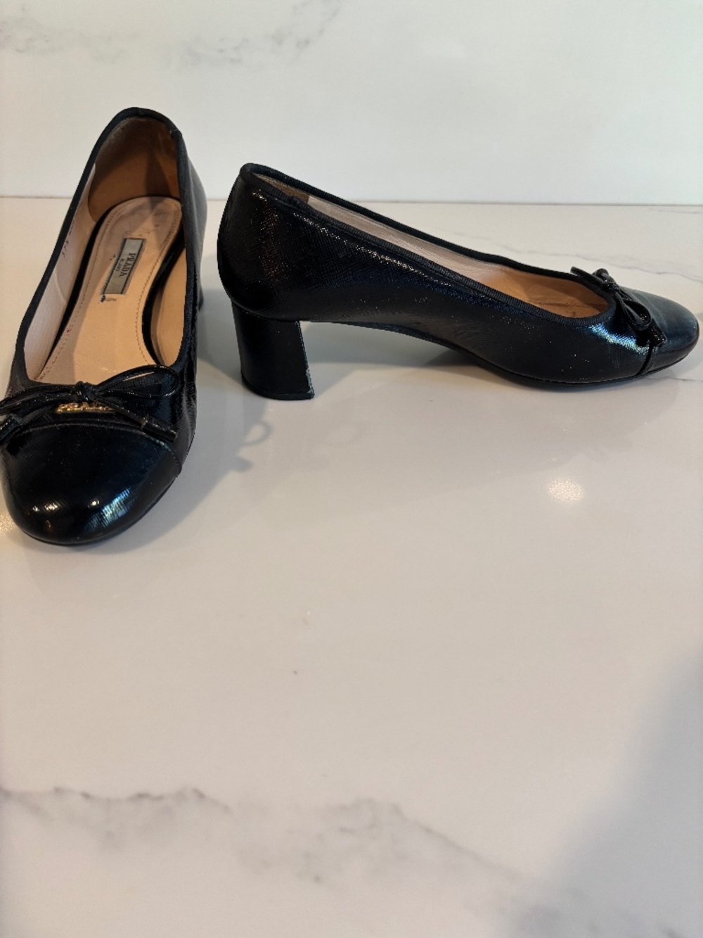 Prada Black Leather Bow Pumps